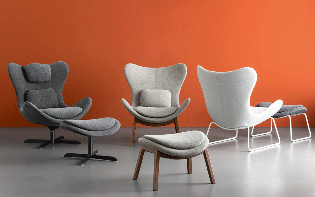 Lazy poltrona di design con pouf Calligaris