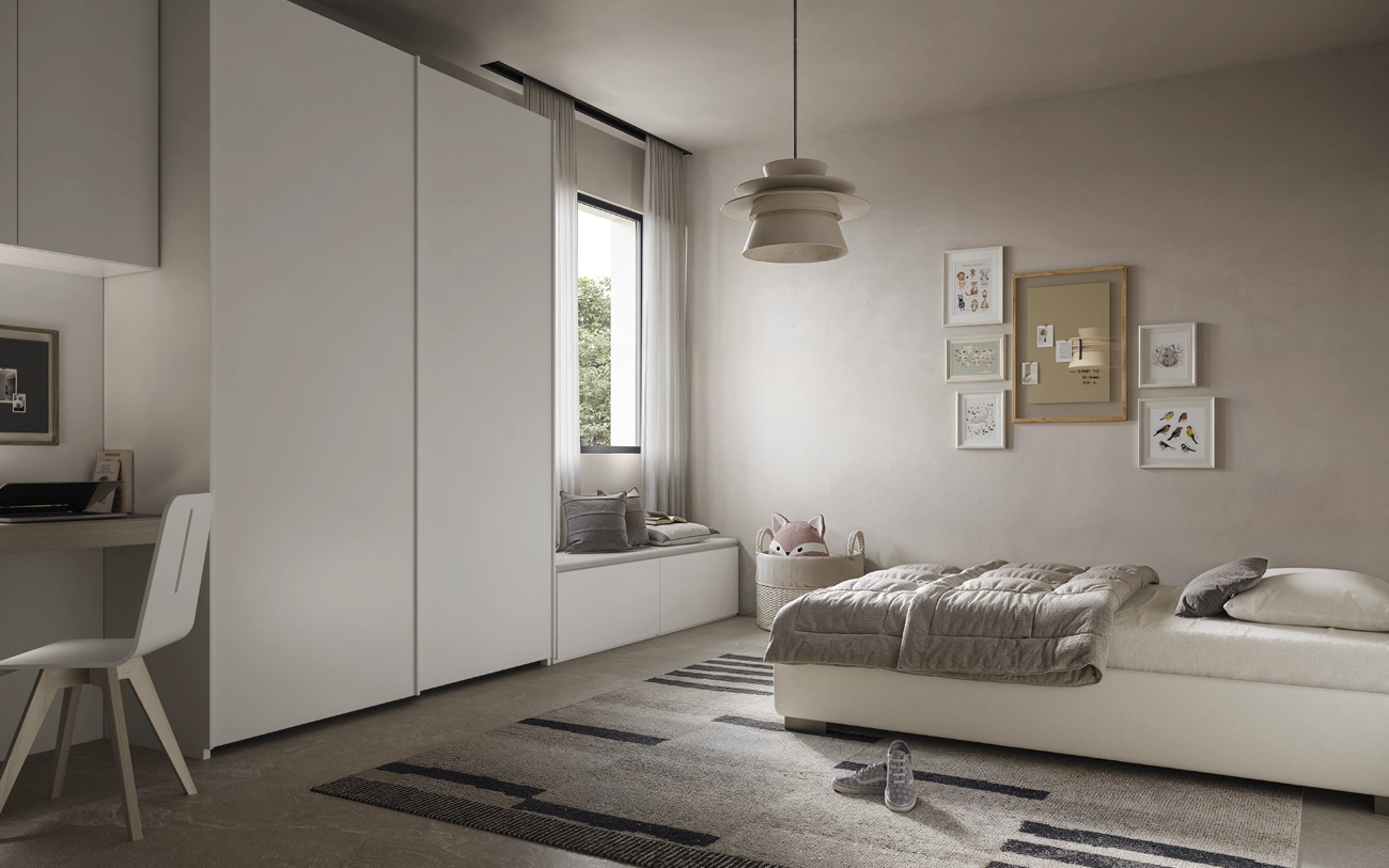 Cameretta young con armadio scorrevole, angolo studio e letto contenitore nelle tonalità del bianco Pensarecasa