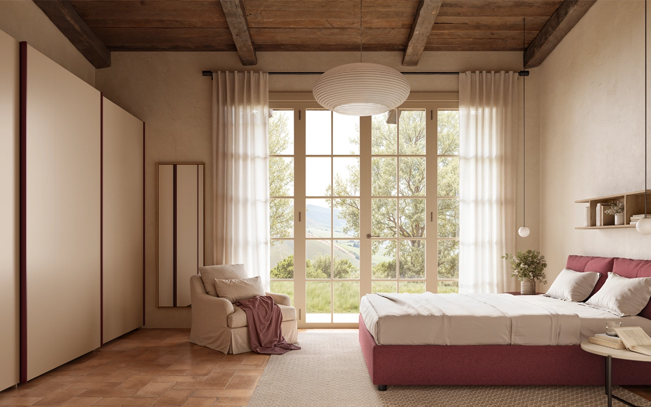 Camera da letto ambientata in Casale con letto in tessuto Marsala e armadio scorrevole in cipria