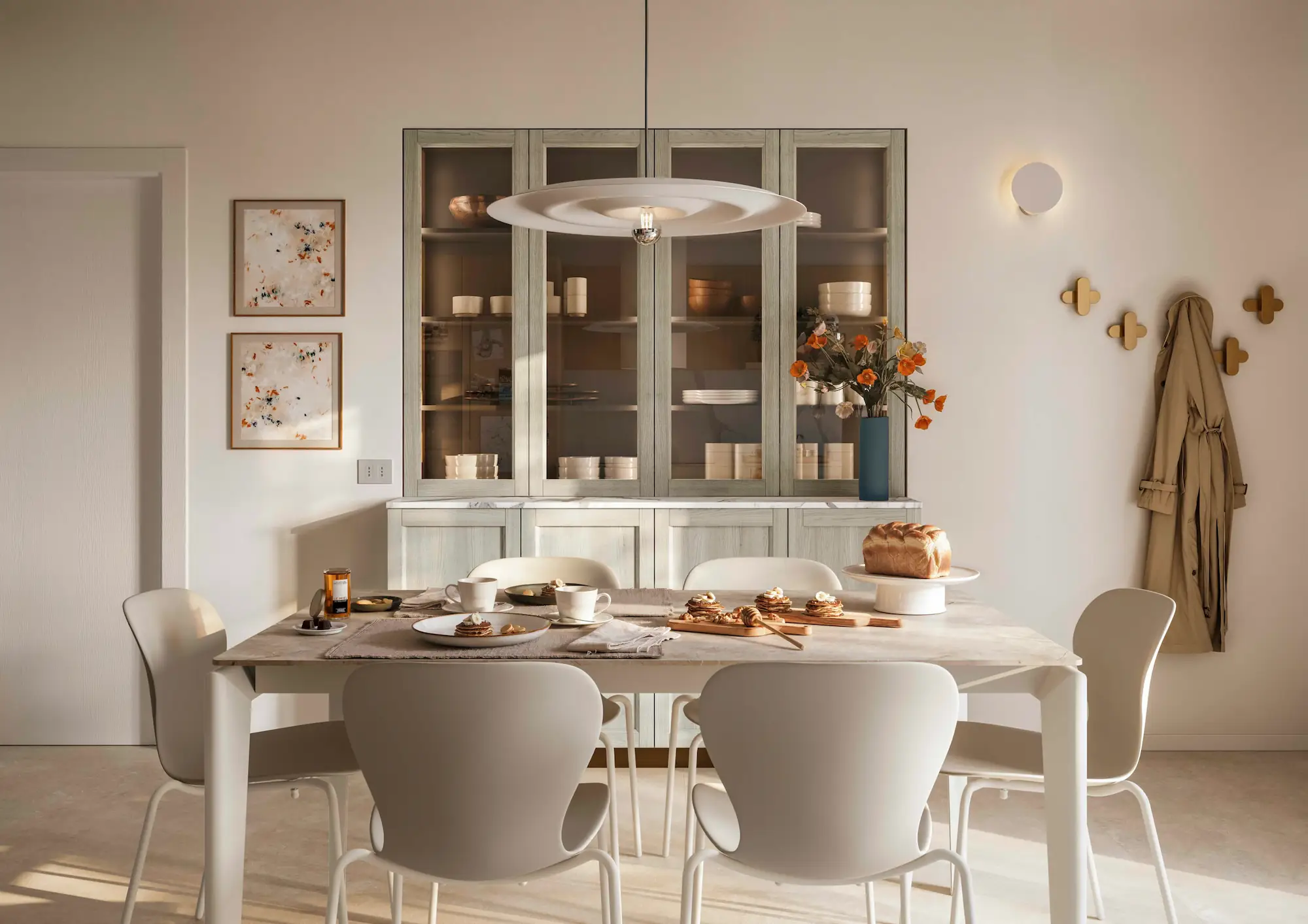Zona pranzo con credenza a vetrina in Rovere Nordico con anta a telaio e tavolo allungabile